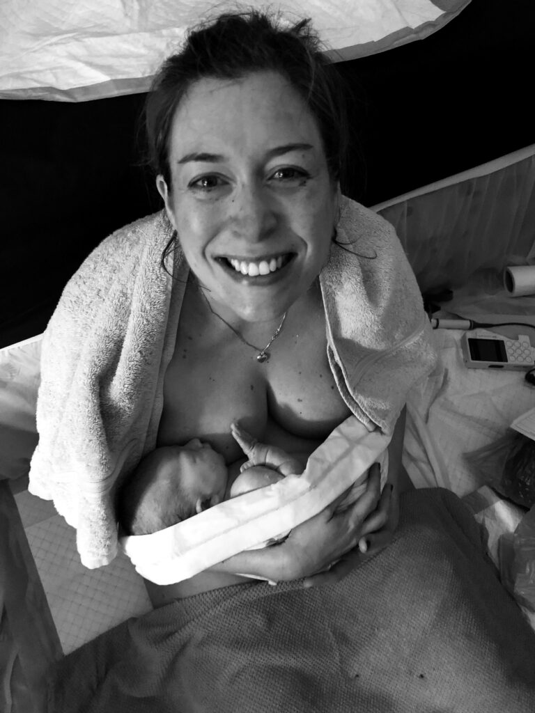 Rachel holding her new baby